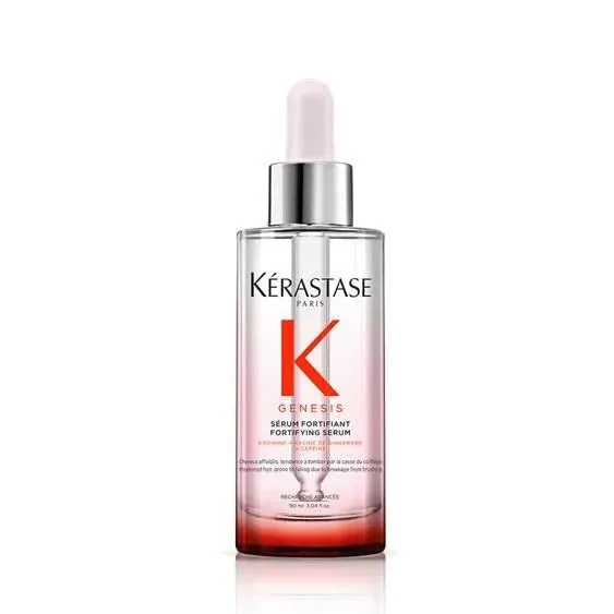 Kerastase Genesis Anti-Chute Fortifiant Serum bottle with ginger and caffeine formula for reducing hair breakage