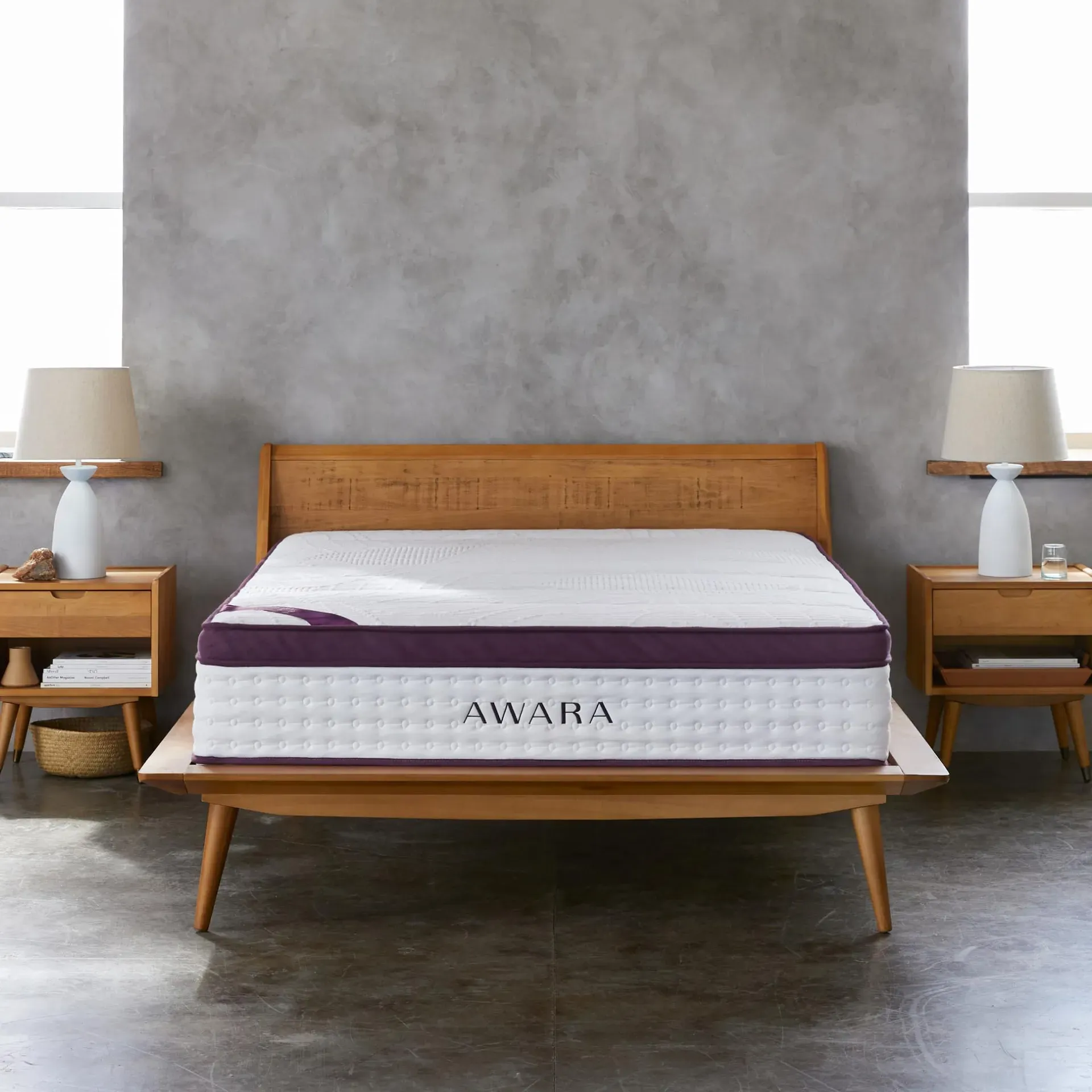 Saatva Classic hybrid mattress with Euro-top and coil system on upholstered bed frame