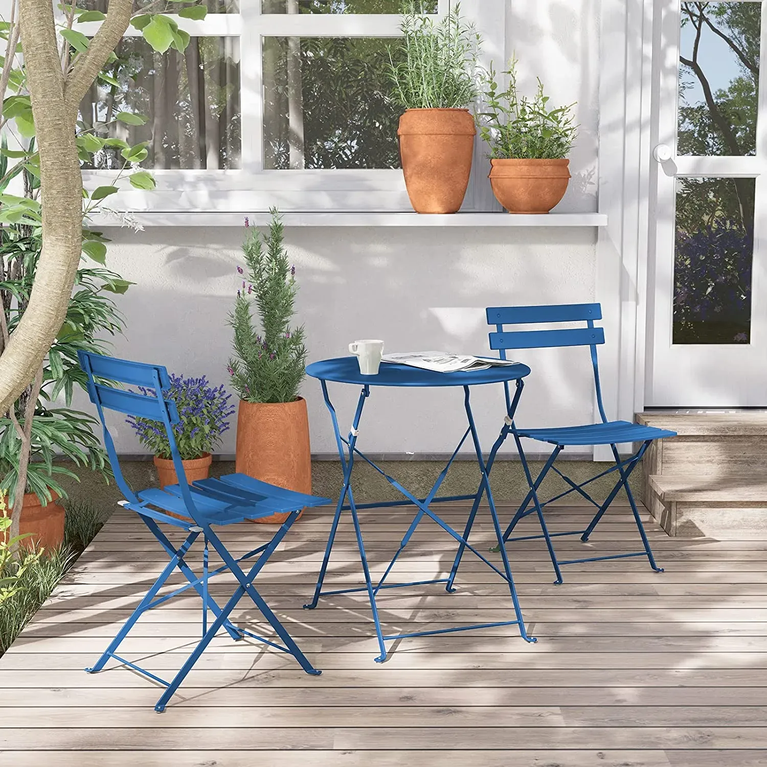Grand Patio premium steel 3-piece folding bistro set in bright blue on a balcony