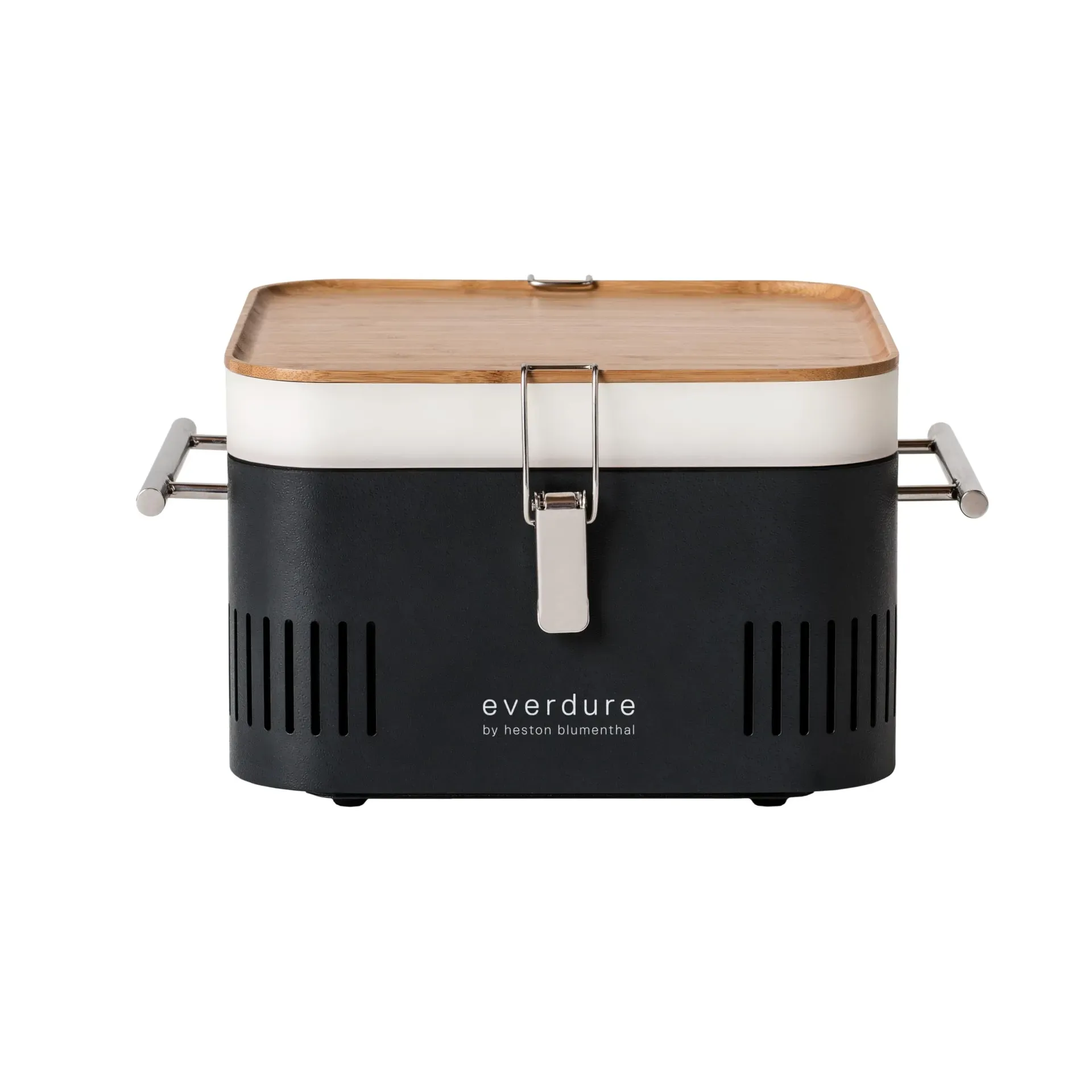Everdure CUBE portable charcoal grill in graphite with bamboo cutting board and storage tray visible