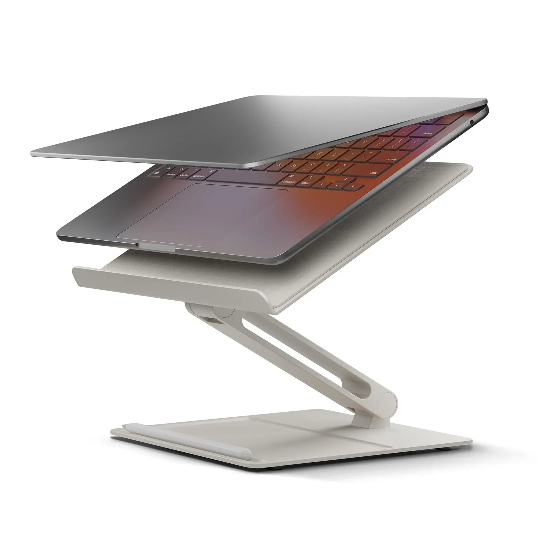 Native Union height adjustable ergonomic laptop stand with fabric surface and integrated pen holder tray on a modern desk
