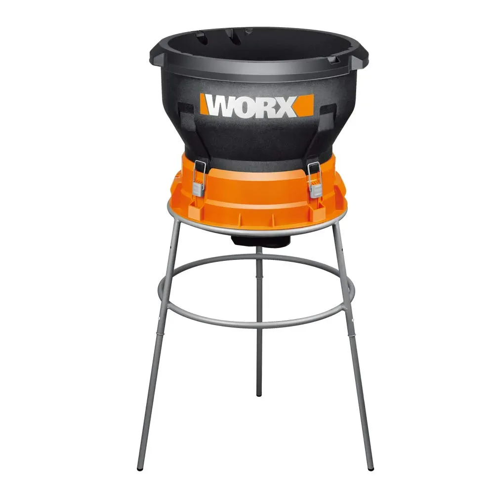 Worx WG430 13-amp electric leaf mulcher shredding dry leaves into fine mulch with Flex-A-Line system