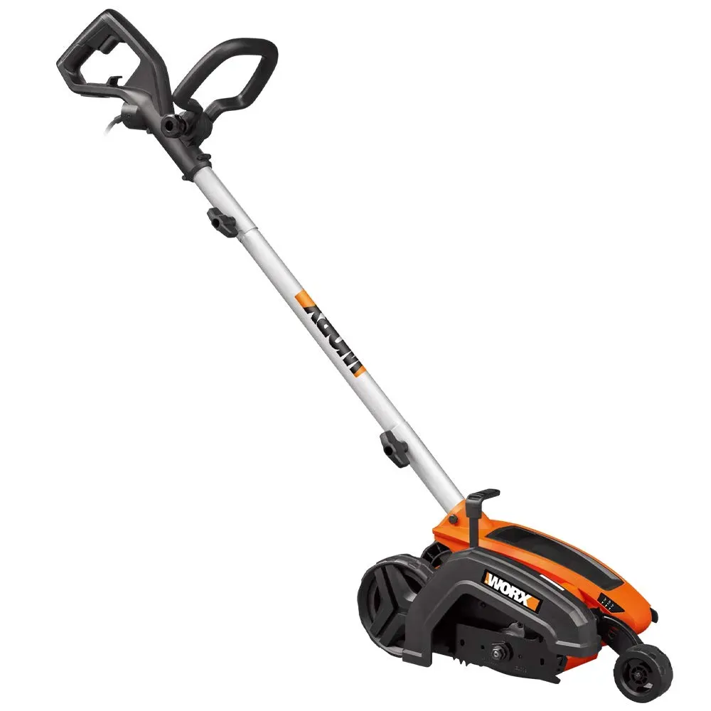 WORX WG896 corded electric lawn edger cutting a clean edge along a concrete driveway