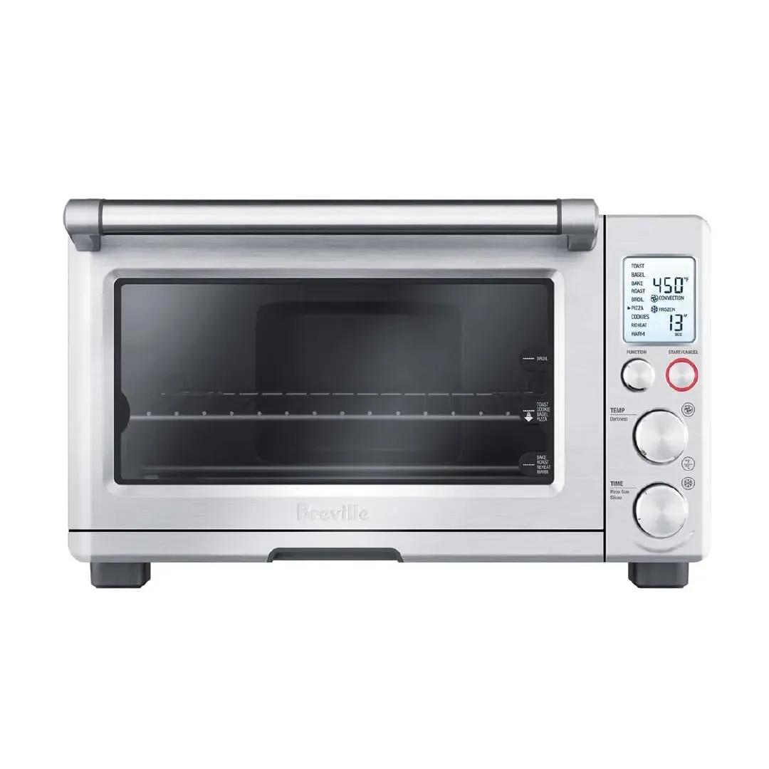 Breville BOV800XL Smart Oven with brushed stainless steel body and LCD display on kitchen counter