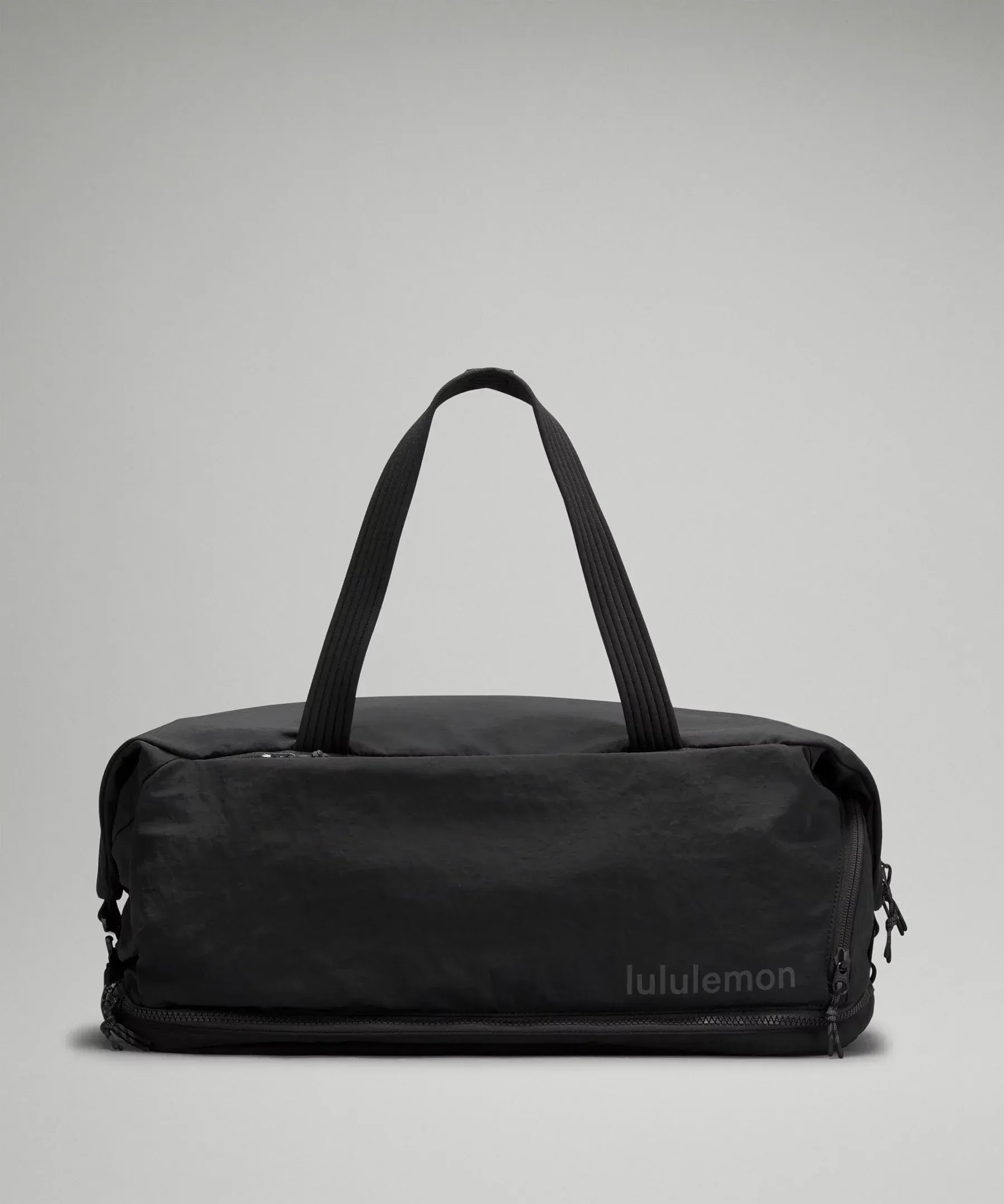 Lululemon 3-in-1 Gym Duffle Bag converting from duffle to tote with detachable shoe pouch