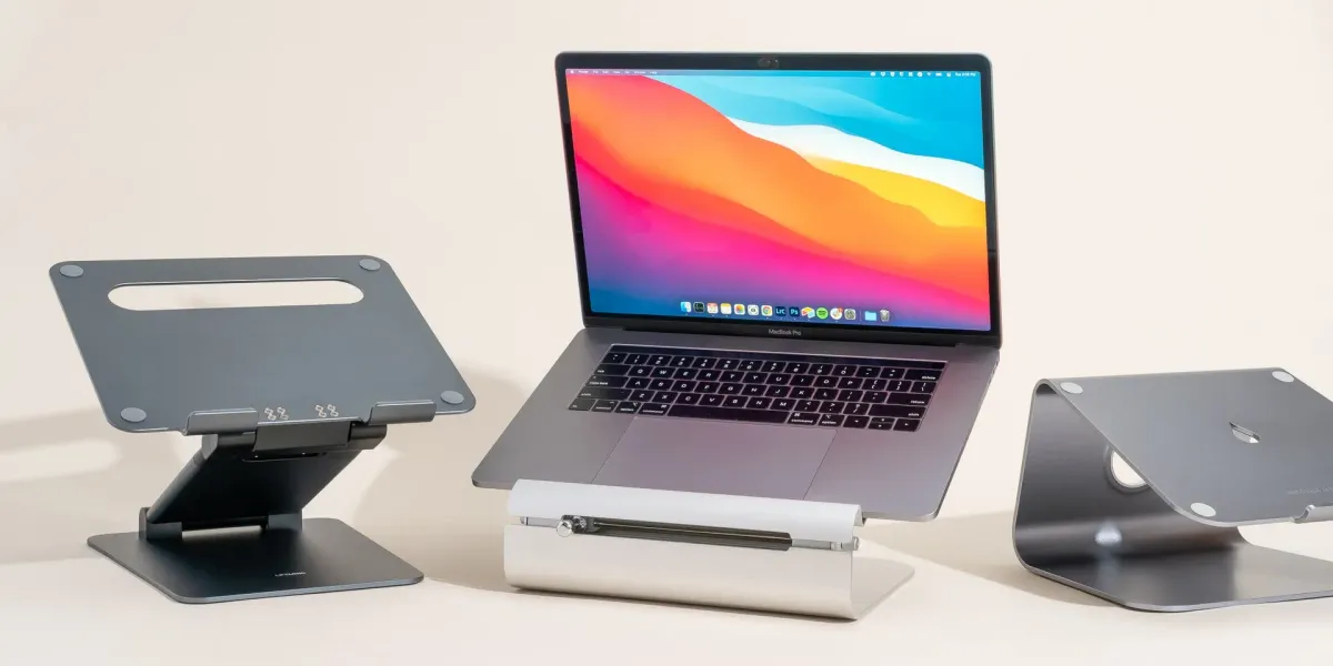 Collection of the top 10 best laptop stands of 2026 featuring aluminum risers, adjustable ergonomic stands, vertical docks, and portable options